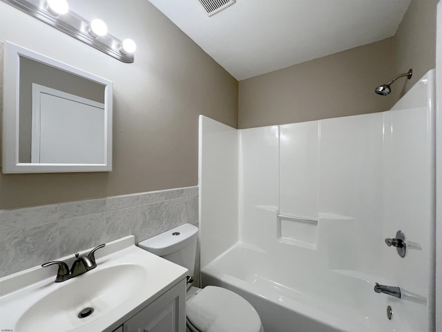 34 Vail Ct Unit 34, Galloway Township, NJ 08205 - full bath with toilet, vanity,  shower combination, tile walls, and wainscoting