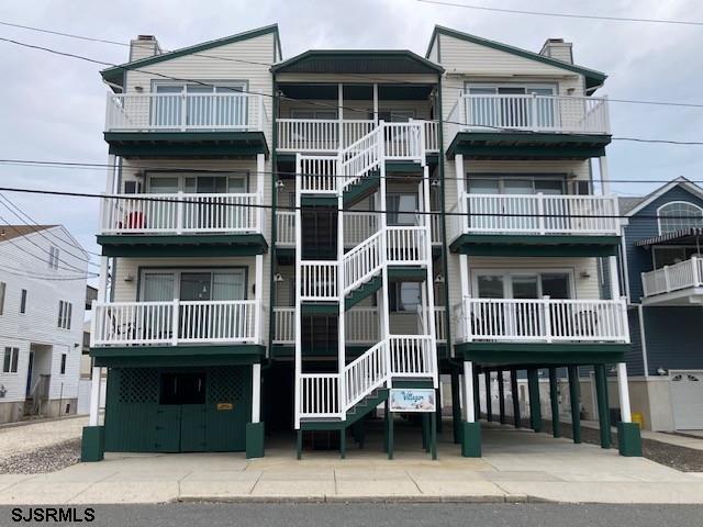 115 35th St Unit 1E, Sea Isle City, NJ 08243 - view of property featuring stairs