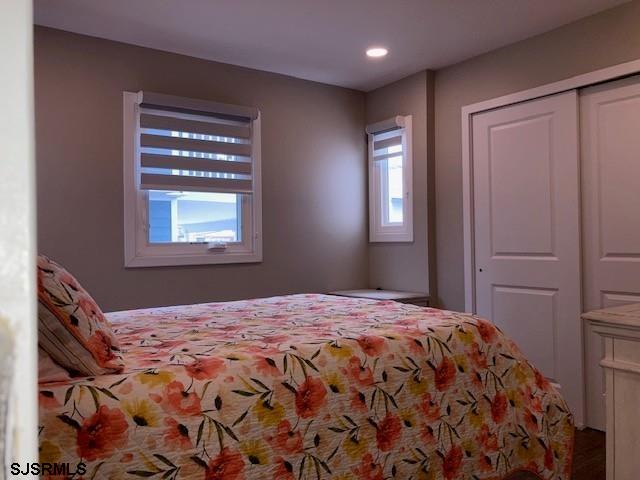 115 35th St Unit 1E, Sea Isle City, NJ 08243 - bedroom with a closet, recessed lighting, and wood finished floors