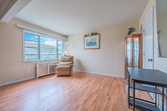 304 N Annapolis Ave, Atlantic City, NJ 08401 - living area with radiator heating unit, wood finished floors, and baseboards