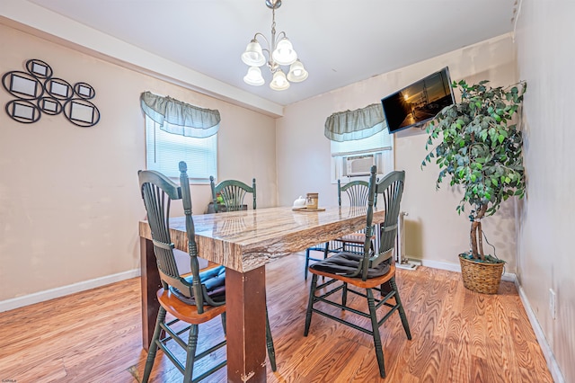 304 N Annapolis Ave, Atlantic City, NJ 08401 - dining space with a chandelier, light wood finished floors, baseboards, and cooling unit