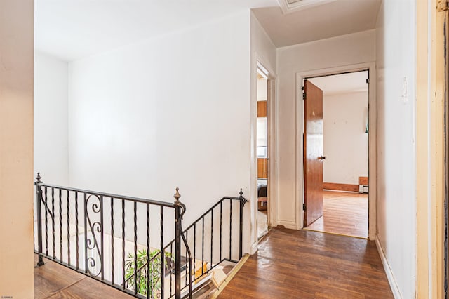 304 N Annapolis Ave, Atlantic City, NJ 08401 - corridor featuring an upstairs landing, wood finished floors, and baseboards