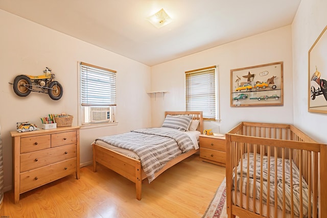 304 N Annapolis Ave, Atlantic City, NJ 08401 - bedroom with light wood finished floors and cooling unit