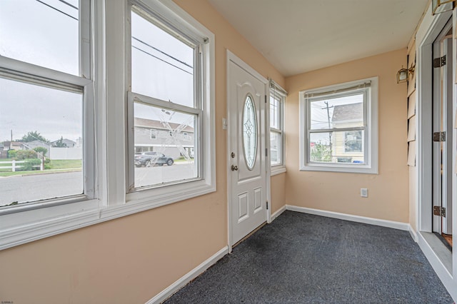 304 N Annapolis Ave, Atlantic City, NJ 08401 - foyer entrance featuring dark colored carpet and baseboards