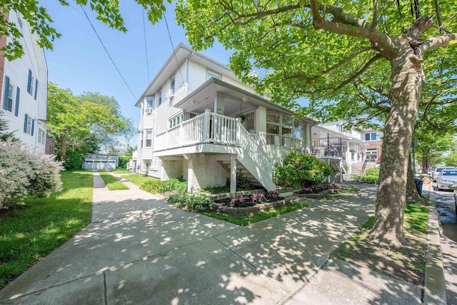 14 N Cambridge Ave, Ventnor, NJ 08406 - view of front facade with stairway and covered porch