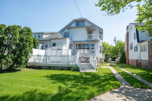 14 N Cambridge Ave, Ventnor, NJ 08406 - view of front of property with a balcony, a front lawn, and a wooden deck