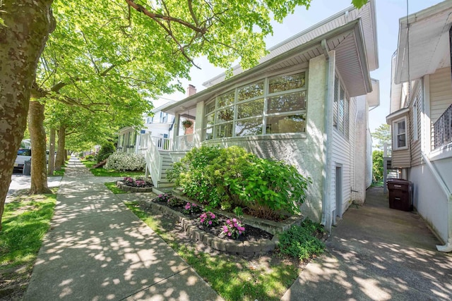 14 N Cambridge Ave, Ventnor, NJ 08406 - view of side of home featuring a chimney