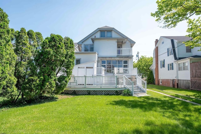 14 N Cambridge Ave, Ventnor, NJ 08406 - rear view of house with a lawn, a balcony, and a deck