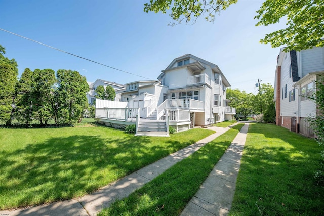 14 N Cambridge Ave, Ventnor, NJ 08406 - view of front facade with a balcony and a front yard