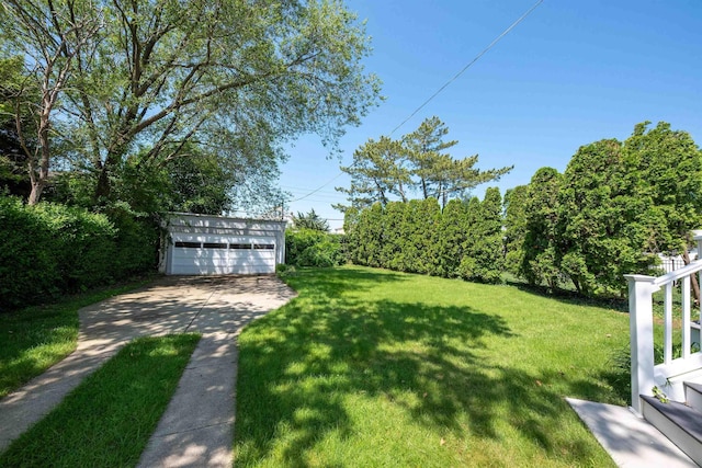 14 N Cambridge Ave, Ventnor, NJ 08406 - view of green lawn featuring a detached garage