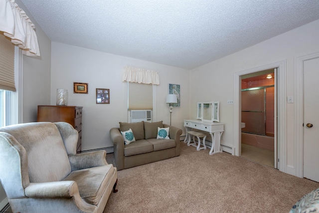 14 N Cambridge Ave, Ventnor, NJ 08406 - living room with carpet floors, a baseboard heating unit, and a textured ceiling