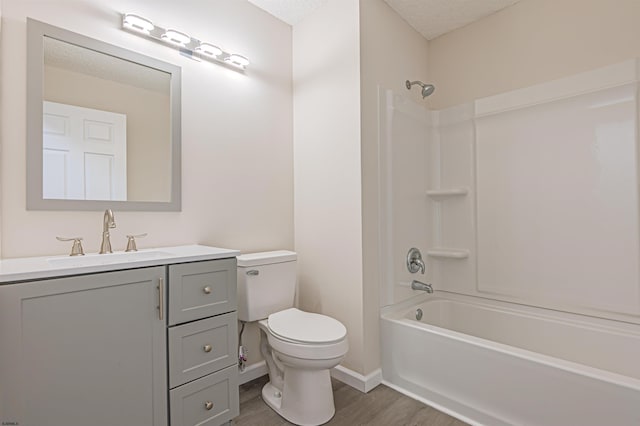 161 Sussex Pl Unit 161, Galloway Township, NJ 08205 - bathroom with wood finished floors, toilet, vanity,  shower combination, and baseboards