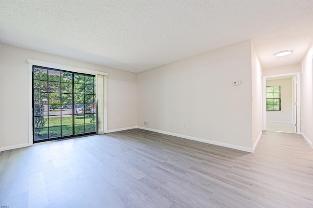 161 Sussex Pl Unit 161, Galloway Township, NJ 08205 - unfurnished room featuring wood finished floors, a textured ceiling, and baseboards