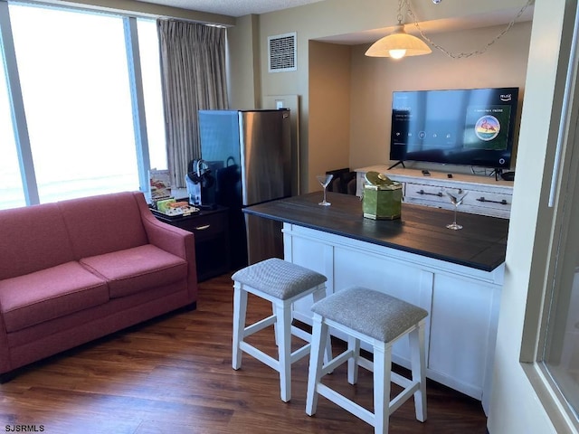 1515 Boardwalk Unit 2805, Atlantic City, NJ 08401 - living room with healthy amount of natural light and dark wood-style flooring
