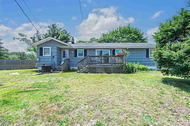 605 W Mill Rd, Northfield, NJ 08225 - rear view of house featuring cooling unit, a deck, and a chimney