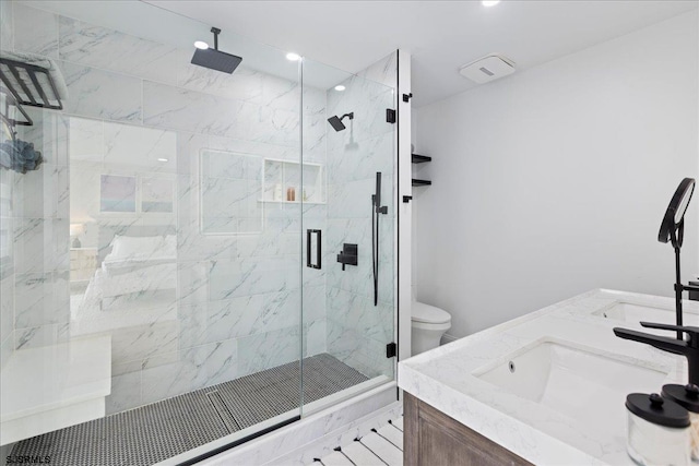 1A N Douglas Ave, Margate, NJ 08402 - bathroom featuring a marble finish shower, double vanity, toilet, and recessed lighting