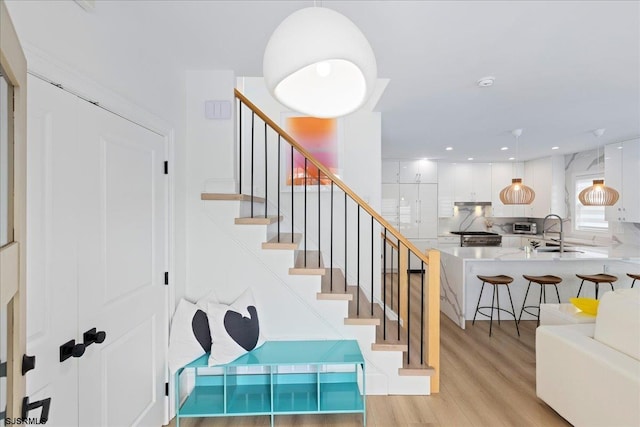 1A N Douglas Ave, Margate, NJ 08402 - stairway featuring wood finished floors and recessed lighting