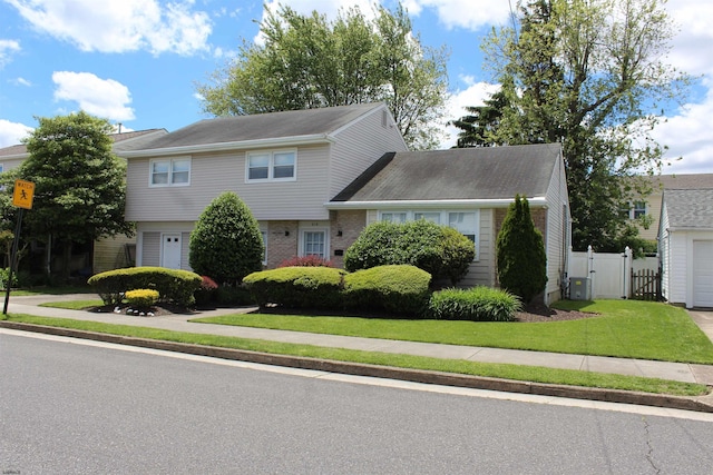 614 N Delavan Ave, Margate, NJ 08406 - view of front of property with a gate and brick siding