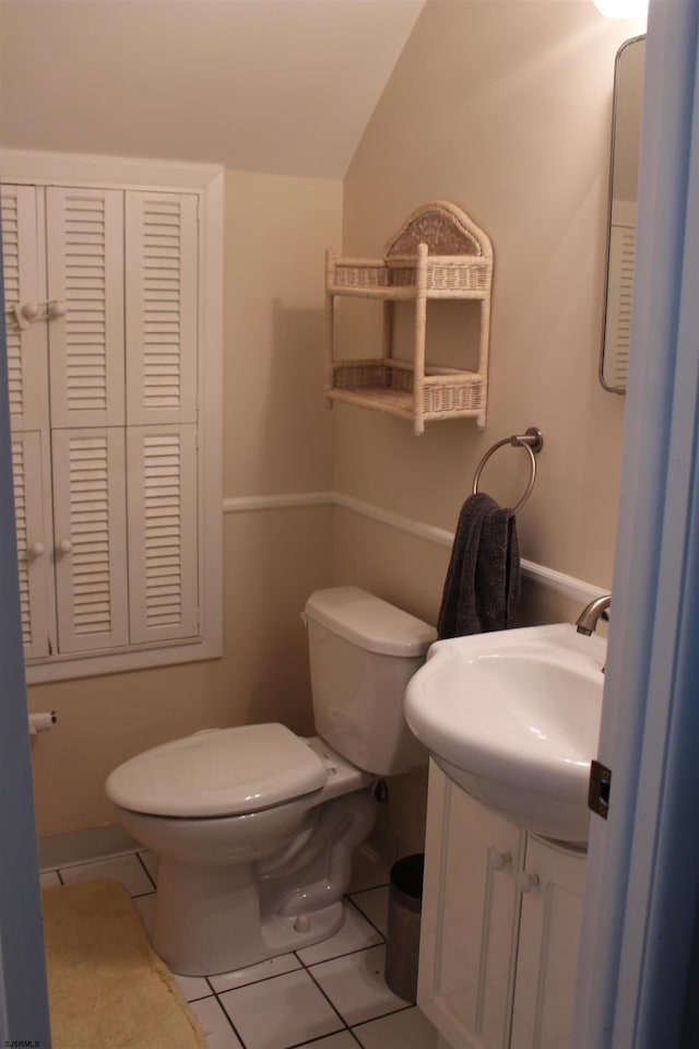 614 N Delavan Ave, Margate, NJ 08406 - bathroom with tile patterned floors, vanity, and vaulted ceiling