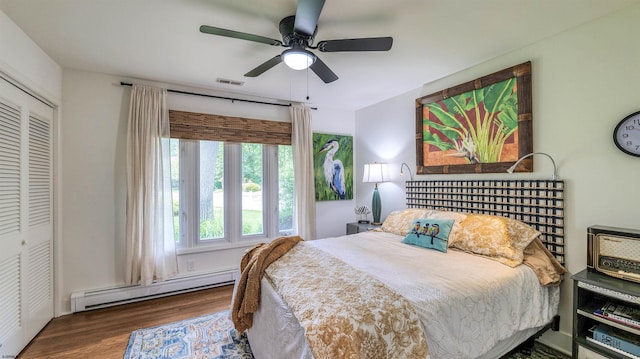 9 Lesley Ln, Northfield, NJ 08225 - bedroom with a baseboard radiator, wood finished floors, a closet, and ceiling fan