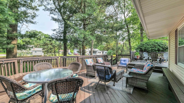 9 Lesley Ln, Northfield, NJ 08225 - deck with outdoor dining space, an outdoor hangout area, and view of scattered trees