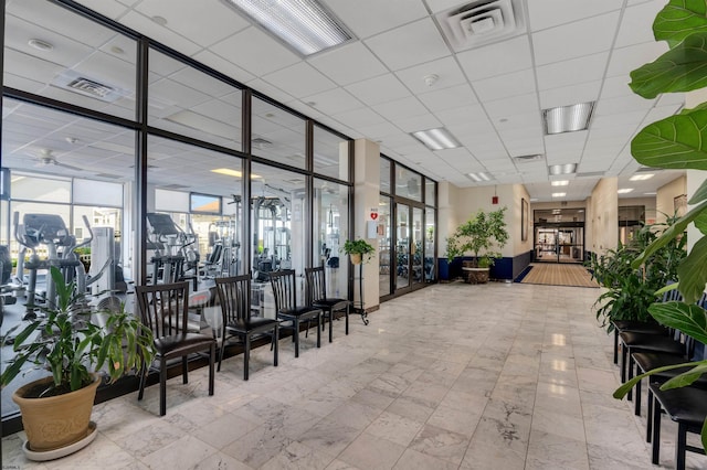 5000 Boardwalk Unit 1806, Ventnor, NJ 08406 - lobby featuring a paneled ceiling and a wall of windows