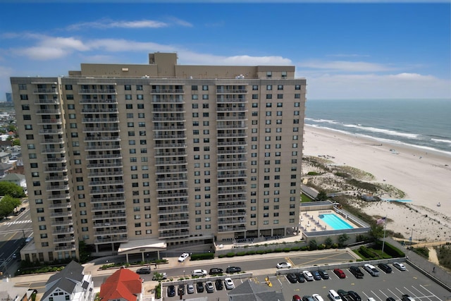 5000 Boardwalk Unit 1806, Ventnor, NJ 08406 - view of apartment building / complex with view of water and beach and uncovered parking