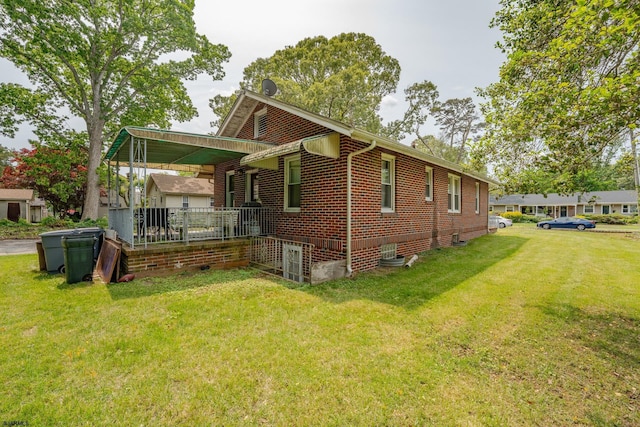 112 Kirklin Ave, Linwood, NJ 08221 - view of property exterior with a lawn, covered porch, and brick siding