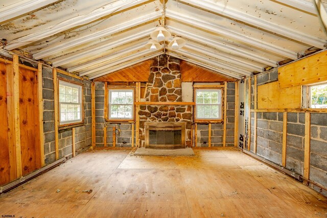 112 Kirklin Ave, Linwood, NJ 08221 - unfurnished living room featuring healthy amount of natural light, vaulted ceiling, and a fireplace