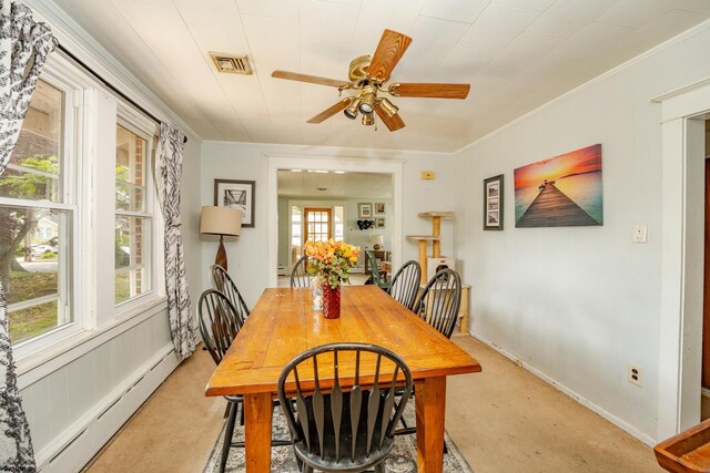 112 Kirklin Ave, Linwood, NJ 08221 - dining area with baseboard heating, light colored carpet, a ceiling fan, and crown molding