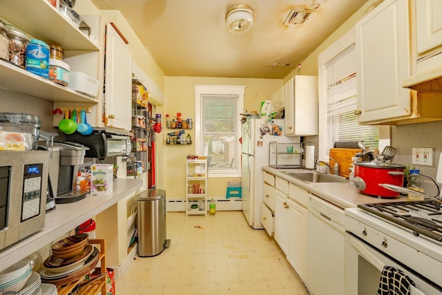 112 Kirklin Ave, Linwood, NJ 08221 - kitchen featuring white appliances, light floors, light countertops, open shelves, and white cabinets