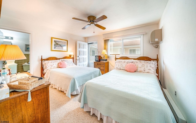 2137 Asbury Ave Unit 19, Ocean City, NJ 08226 - bedroom featuring a wall unit AC, ceiling fan, and light carpet