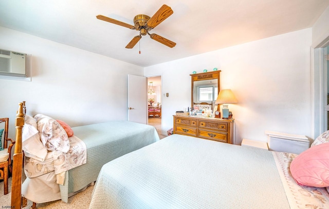 2137 Asbury Ave Unit 19, Ocean City, NJ 08226 - carpeted bedroom with a wall mounted air conditioner and a ceiling fan