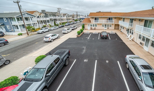 2137 Asbury Ave Unit 19, Ocean City, NJ 08226 - uncovered parking lot with a residential view