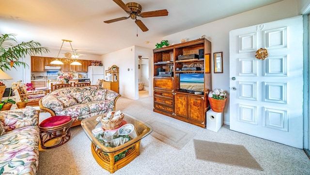 2137 Asbury Ave Unit 19, Ocean City, NJ 08226 - living area with ceiling fan and light colored carpet