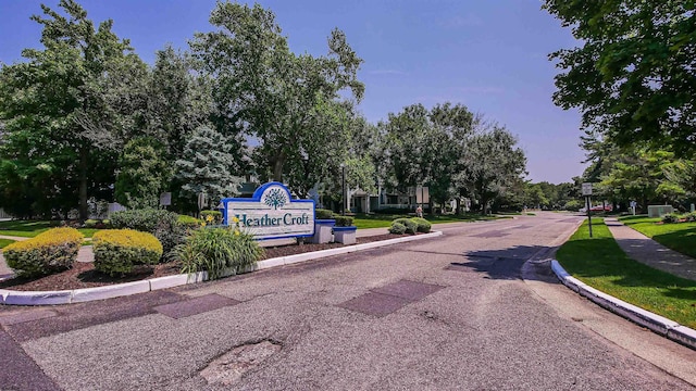 275 Heather Croft Unit 275, Egg Harbor Township, NJ 08234 - view of asphalt street with curbs, sidewalks, and traffic signs