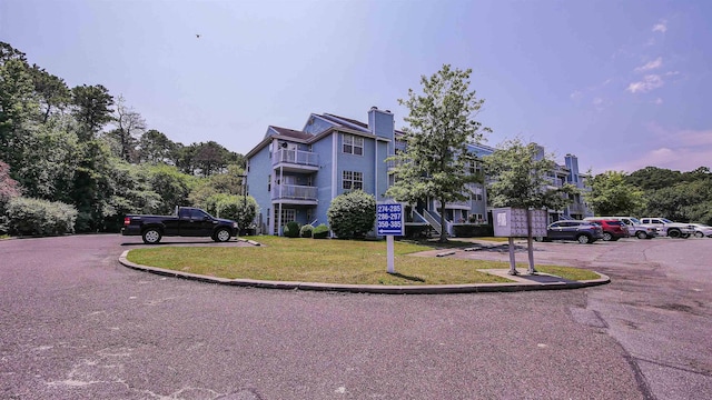 275 Heather Croft Unit 275, Egg Harbor Township, NJ 08234 - view of building exterior featuring uncovered parking