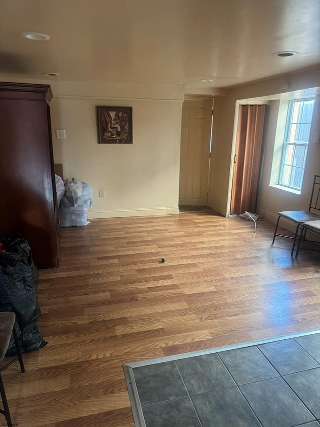 118 N Morris Ave, Atlantic City, NJ 08401 - unfurnished living room featuring light wood-style floors and baseboards