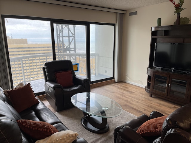 3101 Boardwalk Unit 2503-A Tower 1, Atlantic City, NJ 08401 - living area with light wood finished floors and a textured ceiling