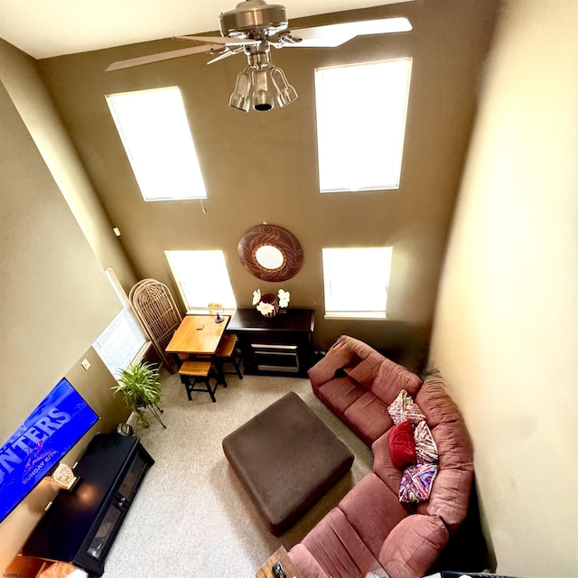 117 N New Jersey Ave Unit 117, Atlantic City, NJ 08401 - carpeted living area featuring plenty of natural light, a ceiling fan, and a high ceiling
