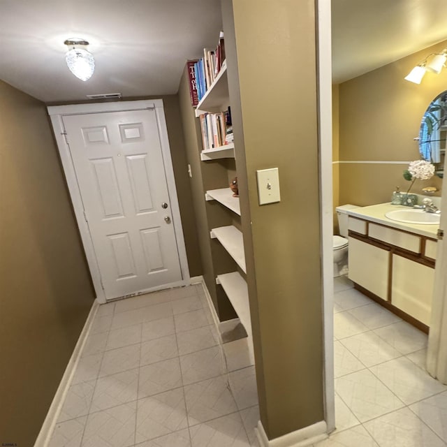 117 N New Jersey Ave Unit 117, Atlantic City, NJ 08401 - doorway to outside featuring baseboards and light tile patterned flooring