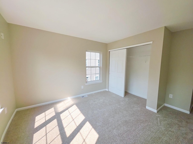 12 Summit Cir Unit C2, Mays Landing, NJ 08330 - unfurnished bedroom featuring carpet floors and a closet