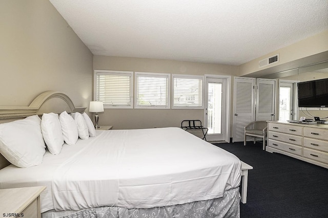 812 Ocean Ave Unit 112, Ocean City, NJ 08226 - bedroom with dark colored carpet and multiple windows