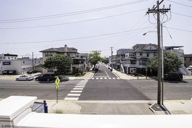 812 Ocean Ave Unit 112, Ocean City, NJ 08226 - view of asphalt street with sidewalks, street lighting, curbs, and a residential view