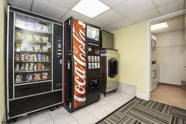 812 Ocean Ave Unit 112, Ocean City, NJ 08226 - laundry area with washer / clothes dryer and light tile patterned flooring