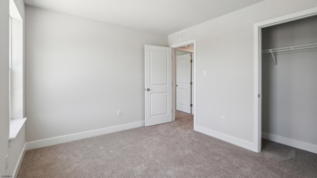 845 Broadway, West Cape May, NJ 08204 - unfurnished bedroom featuring carpet flooring and a closet