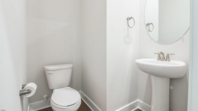 845 Broadway, West Cape May, NJ 08204 - bathroom featuring baseboards and toilet