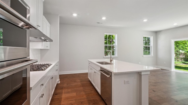 845 Broadway, West Cape May, NJ 08204 - kitchen featuring appliances with stainless steel finishes, dark wood-style flooring, light countertops, plenty of natural light, and recessed lighting