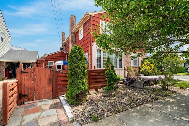 8407 Fremont Ave, Margate, NJ 08402 - view of front of house featuring a gate and brick siding