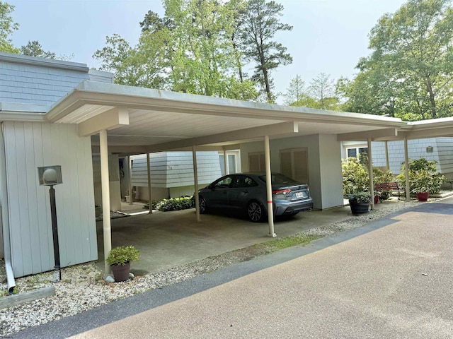 170 E Holly Ln Unit 170, Little Egg Harbor, NJ 08087 - view of vehicle parking featuring a carport